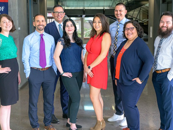Glen Fogerty, PhD, MBA (third from left), College of Medicine – Phoenix admissions and recruitment associate dean, with his admissions team (L-R): Alex Hughes, Mark Priolo, Dr. Fogerty, Enjoli Pescheta, Julie Chiu, Chip Young, Shari Carbajal and Sam Blair.