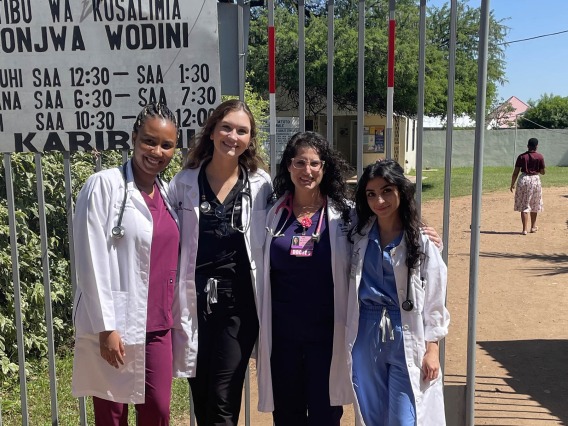Sommer Aldulaimi, MD (second from right), with University of Arizona College of Medicine – Tucson students Jasmine Locke, Lacey Culpepper and Pantea Sazegar, collaborated with and provided training to assist in opening the hospital newborn unit at the Songambele Health Centre in Tanzania in May 2022. 