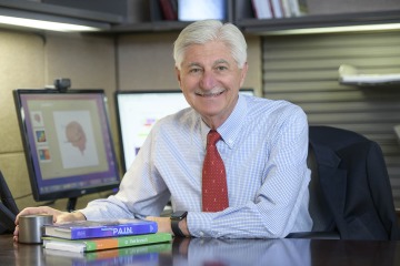portrait of pain and addiction researcher Frank Porreca in his office at the University of Arizona Health Sciences