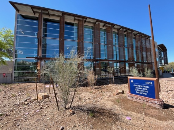 building with glass and steel façade and a University of Arizona sign that says “Andrew Weil Center for Integrative Medicine