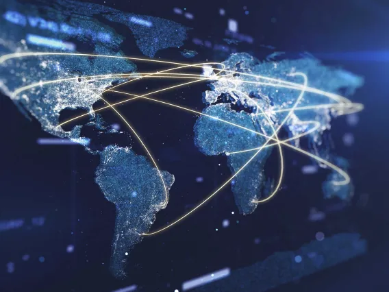 An illustration of the globe with paths representing information criss-crossing various nations