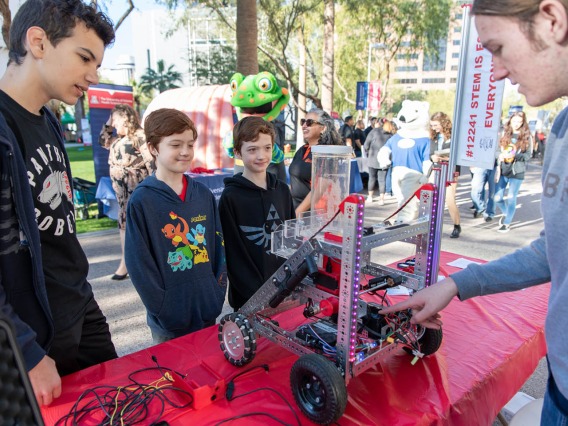 Kids learn about robotics during a demonstration.