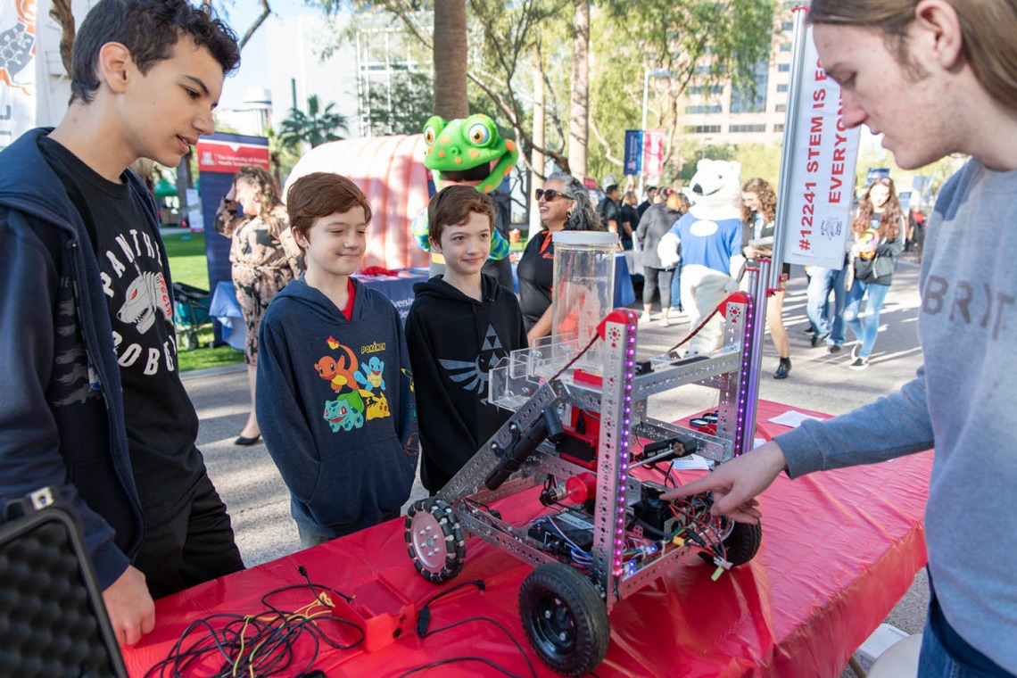 Kids learn about robotics during a demonstration.