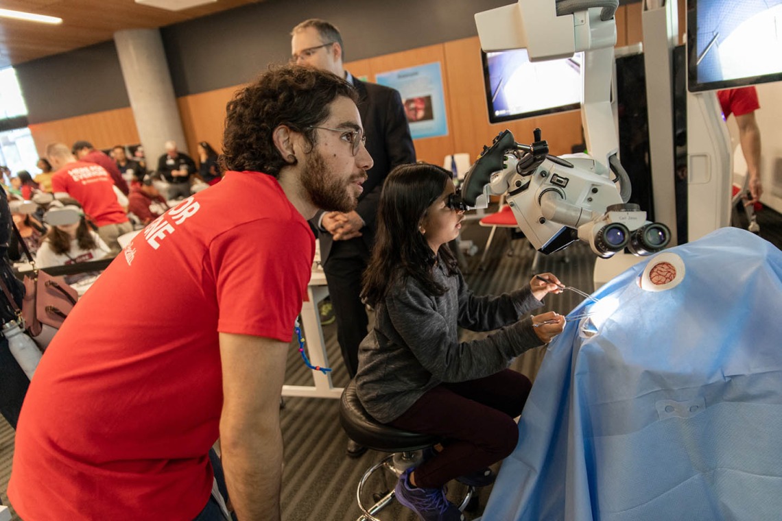 Child attending BrainWorks Lab, gets to experience what it’s like to operate on a human brain; powered by Banner Health and the College of Medicine – Phoenix.