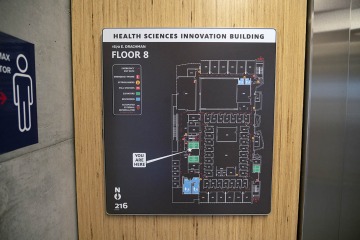 Building floorplan in the Health Sciences Innovation Building located beside and elevator.