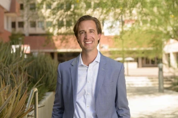 Portrait of Dan Combs, MD, outside. 