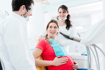 Pregnant female at a dental appointment